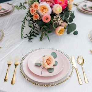 Blush Dishes with gold flatware